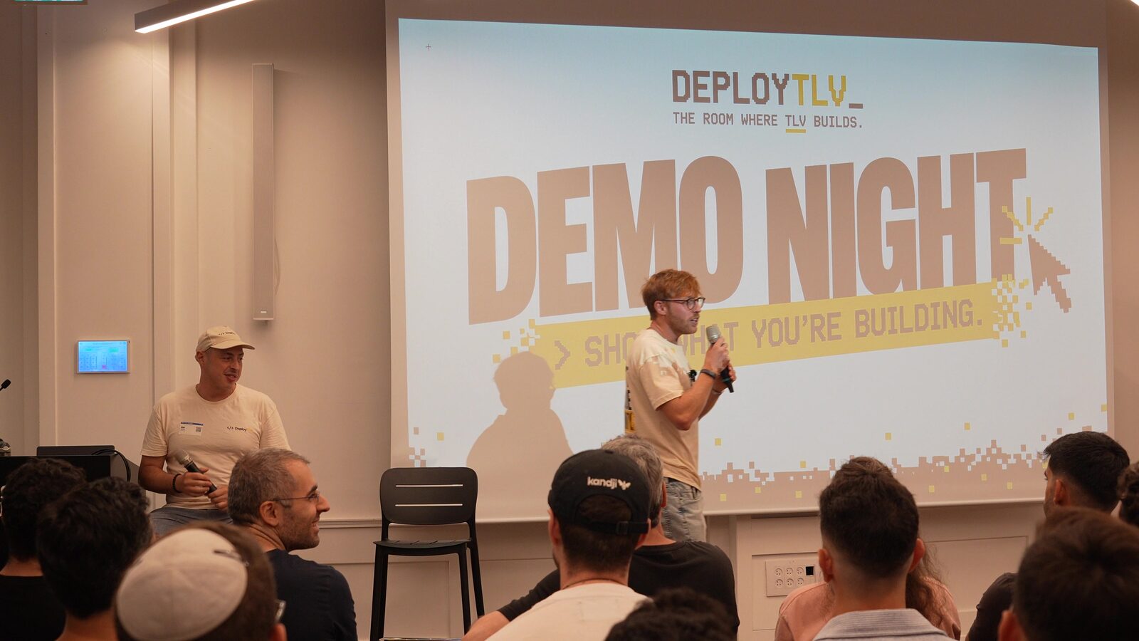 Myron hosting demo night in front of the crowd