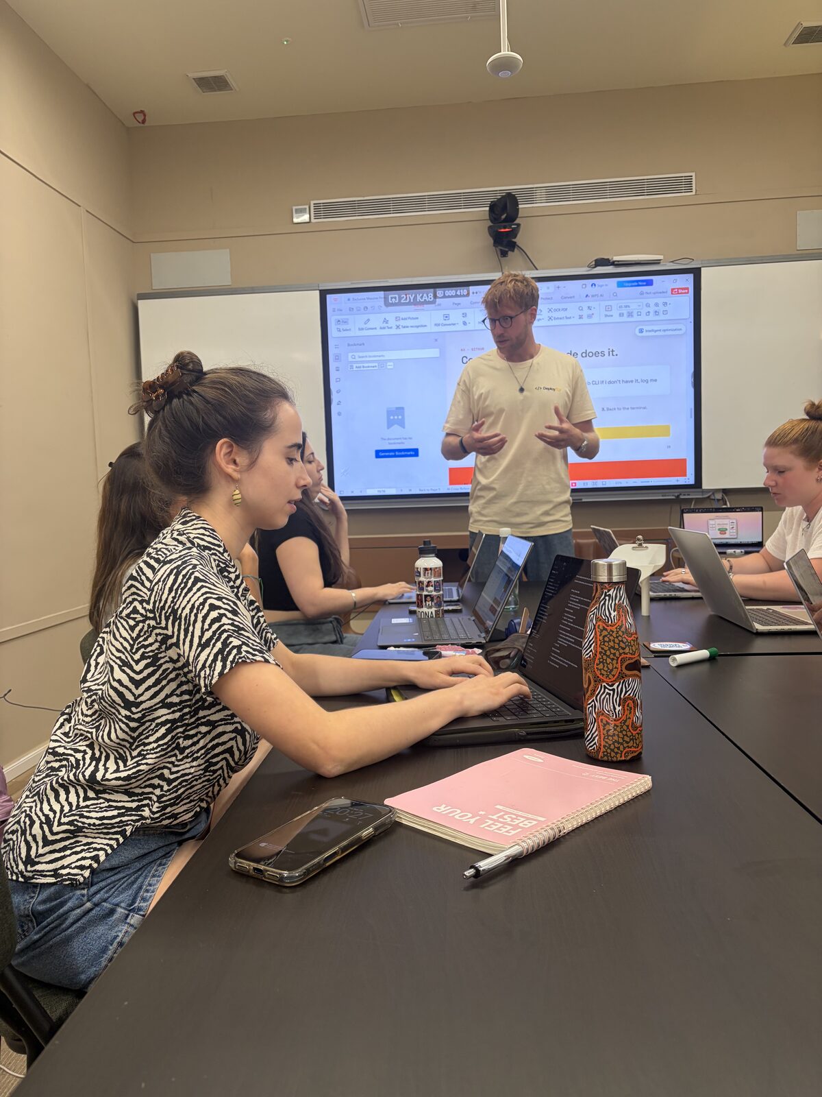 Myron teaching at the screen during Deploy Academy